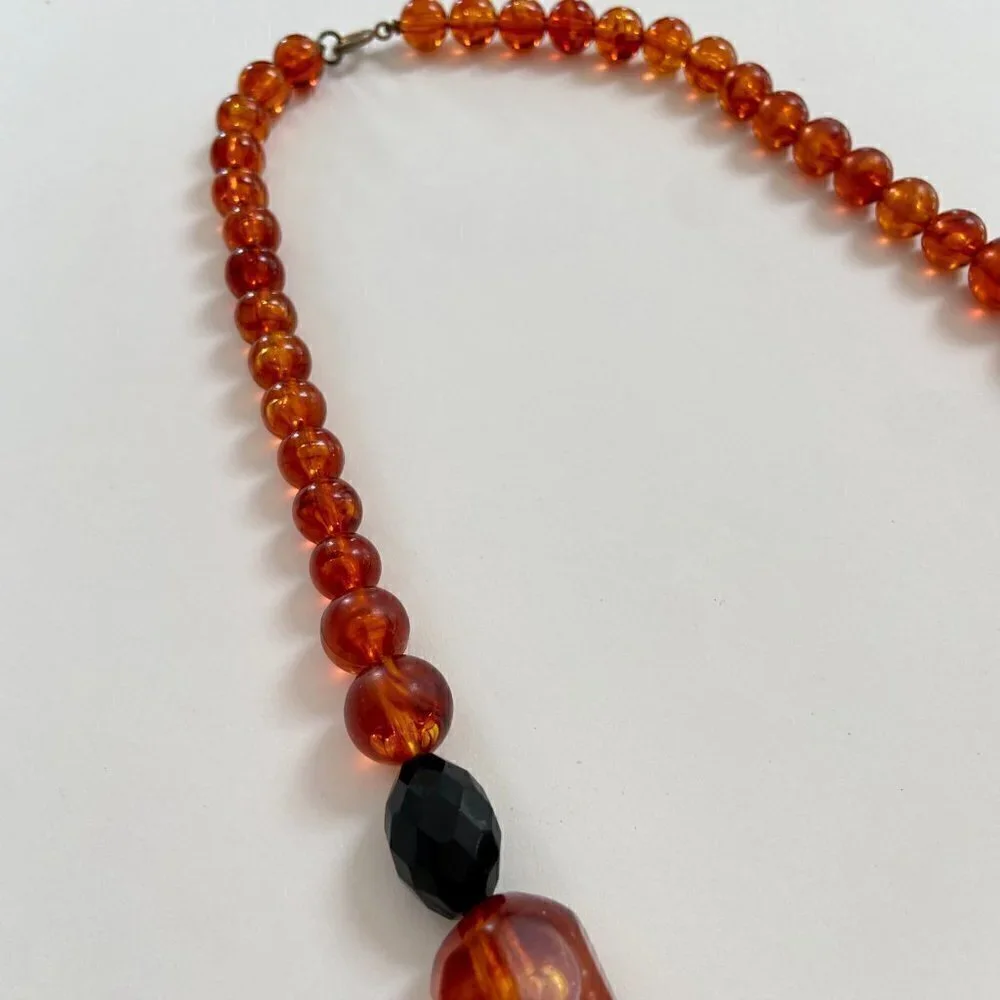 Orange and black beaded necklace